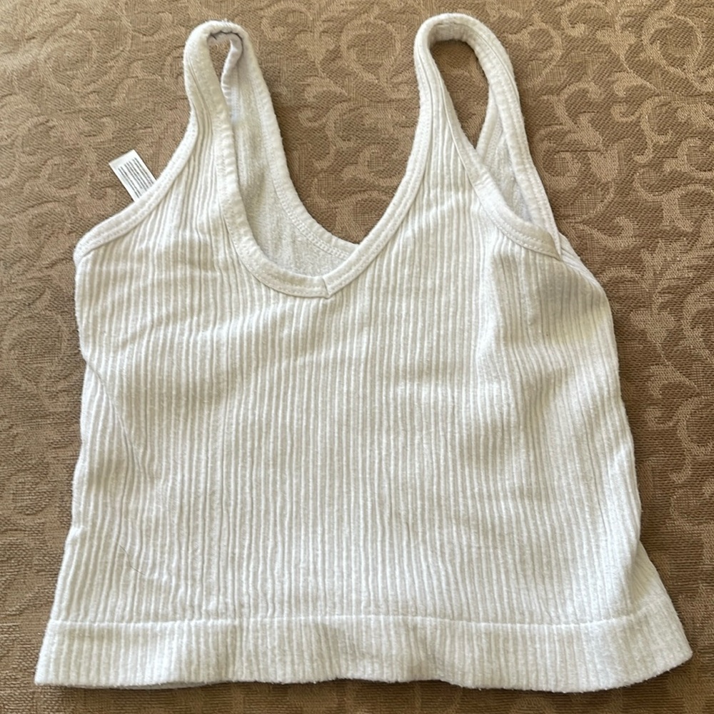 Small cropped tank top out from under